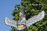 Detail of a totem pole at Stanley Park, Vancouver, BC