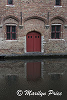 Door reflected in a canal, Bruges, Belgium