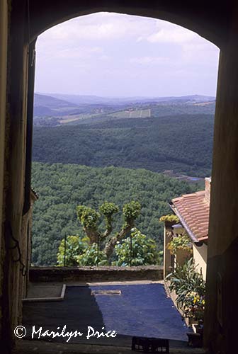 Countryside through an archway, Radda in Chianti, Italy